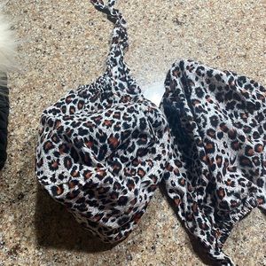 Two leopard scrub caps